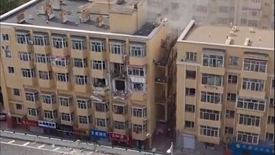 In this image, the aftermath of an explosion at an apartment building is seen in Harbin in northeastern China's Heilongjiang province on Thursday. (AP) In this image, the aftermath of an explosion at an apartment building is seen in Harbin in northeastern China's Heilongjiang province on Thursday. (AP)