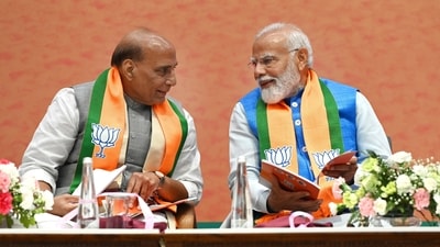 Prime Minister Narendra Modi, defence minister Rajnath Singh during the launch of BJP's Sankalp Patra for Lok Sabha Elections 2024 at BJP HQ, in New Delhi, India, on Sunday, April 14, 2024. (Photo by Ajay Aggarwal/ Hindustan Times) Prime Minister Narendra Modi, defence minister Rajnath Singh during the launch of BJP's Sankalp Patra for Lok Sabha Elections 2024 at BJP HQ, in New Delhi, India, on Sunday, April 14, 2024. (Photo by Ajay Aggarwal/ Hindustan Times)