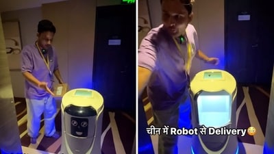 The image shows an influencer from UP standing in front of a robot in China. (Instagram/@shridhar.m) The image shows an influencer from UP standing in front of a robot in China. (Instagram/@shridhar.m)