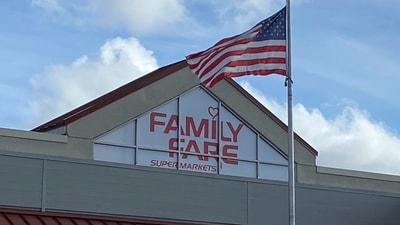 Contractors curious about an extension cord on the roof of a Michigan grocery store made a startling discovery: A 34-year-old woman was living inside the business sign. (AP) Contractors curious about an extension cord on the roof of a Michigan grocery store made a startling discovery: A 34-year-old woman was living inside the business sign. (AP)