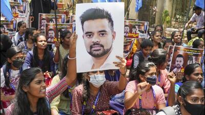 NSUI members hold a poster of JD(S) MP Prajwal Revanna during a protest against his involvement in the alleged sexual abuse case, in Bengaluru, on April 30, 2024. (PTI) NSUI members hold a poster of JD(S) MP Prajwal Revanna during a protest against his involvement in the alleged sexual abuse case, in Bengaluru, on April 30, 2024. (PTI)