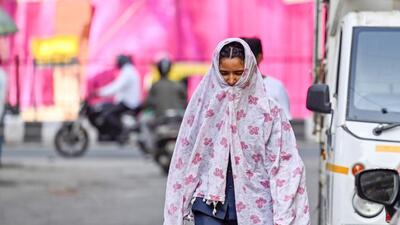 New Delhi, India - May 23, 2024: Girl covering her face with scarf During harsh sunlight on hot and bright summer afternoon, at Pandav nagar in New Delhi, India, on Thursday, May 23, 2024. (Photo by Raj K Raj/ Hindustan Times) (Hindustan Times) New Delhi, India - May 23, 2024: Girl covering her face with scarf During harsh sunlight on hot and bright summer afternoon, at Pandav nagar in New Delhi, India, on Thursday, May 23, 2024. (Photo by Raj K Raj/ Hindustan Times) (Hindustan Times)
