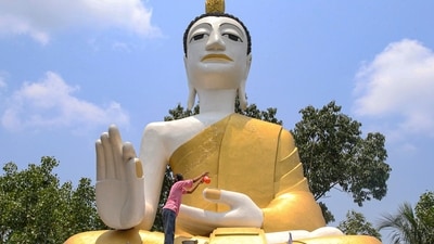 Buddha Purnima 2024: A statue of Lord Buddha being cleaned as part of preparations ahead of Buddha Purnima festival, in Agartala. (PTI)