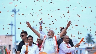 Prime Minister Narendra Modi during a road show in Puri on Monday. (ANI) Prime Minister Narendra Modi during a road show in Puri on Monday. (ANI)
