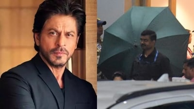 Shah Rukh Khan hid behind an umbrella despite fans waiting to catch a glimpse of him.