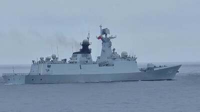 This handout photo taken and released by the Taiwan Coast Guard on May 23, 2024 shows a Chinese military ship northwest of Pengjia Island, off the coast of northern Taiwan. China on May 23 encircled Taiwan with naval vessels and military aircraft in war games aimed at punishing the self-ruled island after its new president vowed to defend democracy. (AFP)