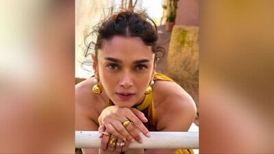 To complete her look, her makeup features nude eyeshadow, winged eyeliner, mascara-coated lashes, defined brows, rosy cheeks with a hint of blush, a radiant highlighter, and a nude lipstick shade, enhancing her natural beauty for the occasion. (Instagram/@aditiraohydari)