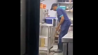 The man was seen cleaning the drain with frying net. The man was seen cleaning the drain with frying net.