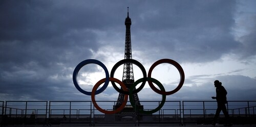 The countdown clock, near the Eiffel Tower shows 100 days to go until the Paris 2024 Olympic Games opening ceremony. (REUTERS)