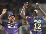 Kolkata Knight Riders' Andre Russell (R) celebrates with teammate Sunil Narine after taking a wicket. Kolkata Knight Riders' Andre Russell (R) celebrates with teammate Sunil Narine after taking a wicket.