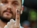 Delhi Lok Sabha Election 2024 phase 6: A voter's finger is marked with indelible ink after casting a ballot at a polling station.(Dhiraj Singh/Bloomberg)