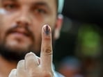 Out of the 1.49 crore voters casting their votes on Friday, 71.08 lakh are women. (Bloomberg/File)