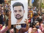 NSUI members hold a poster of JD(S) MP Prajwal Revanna during a protest against his involvement in the alleged sexual abuse case, in Bengaluru on April 30 (PTI FILE PHOTO) NSUI members hold a poster of JD(S) MP Prajwal Revanna during a protest against his involvement in the alleged sexual abuse case, in Bengaluru on April 30 (PTI FILE PHOTO)