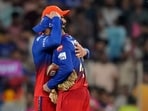 Virat Kohli hugs Dinesh Karthik. Virat Kohli hugs Dinesh Karthik.
