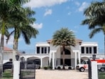 Sean Kingston's Southwest Ranches, Fla., home is shown during a raid by the Broward Sheriff's Office on Thursday, May 23, 2024. A SWAT team raided rapper Kingston's rented mansion on Thursday, and arrested his mother on fraud and theft charges that an attorney says stems partly from the installation of a massive TV at the home. (Amy Beth Bennett/South Florida Sun-Sentinel via AP) Sean Kingston's Southwest Ranches, Fla., home is shown during a raid by the Broward Sheriff's Office on Thursday, May 23, 2024. A SWAT team raided rapper Kingston's rented mansion on Thursday, and arrested his mother on fraud and theft charges that an attorney says stems partly from the installation of a massive TV at the home. (Amy Beth Bennett/South Florida Sun-Sentinel via AP)