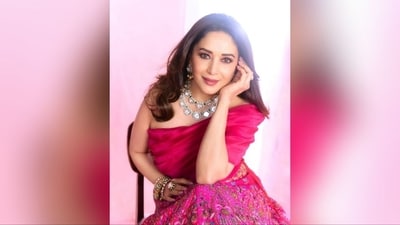 Assisted by hairstylist Sheetal Khan, Madhuri styled her luscious locks into soft curls and left them open at the centre to cascade beautifully down her shoulders, perfectly rounding off her stunning look. (Instagram/@madhuridixitnene) Assisted by hairstylist Sheetal Khan, Madhuri styled her luscious locks into soft curls and left them open at the centre to cascade beautifully down her shoulders, perfectly rounding off her stunning look. (Instagram/@madhuridixitnene)