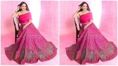 Assisted by celebrity fashion stylist Ami Patel, Madhuri accessorised her look with a multi-layered diamond necklace, statement earrings, a white kundan studded bracelet on her wrist, a diamond ring adorning her finger and a pair of high heels to complete her glam look. (Instagram/@madhuridixitnene) Assisted by celebrity fashion stylist Ami Patel, Madhuri accessorised her look with a multi-layered diamond necklace, statement earrings, a white kundan studded bracelet on her wrist, a diamond ring adorning her finger and a pair of high heels to complete her glam look. (Instagram/@madhuridixitnene)
