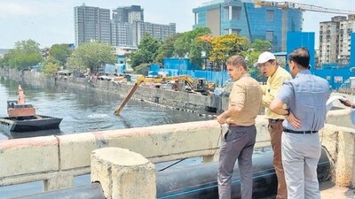 BMC chief Bhushan Gagrani inspects nallah at Vakola and Mithi River on Thursday BMC chief Bhushan Gagrani inspects nallah at Vakola and Mithi River on Thursday