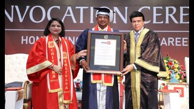 Brigadier Dr Arvind Lal being conferred upon an honorary degree of doctor of literature (honoris causa) at Chitkara University. (HT Photo) Brigadier Dr Arvind Lal being conferred upon an honorary degree of doctor of literature (honoris causa) at Chitkara University. (HT Photo)