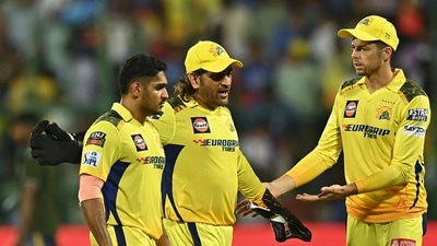 Chennai Super Kings' MS Dhoni (C) speaks with teammate Tushar Deshpande (L) (AFP) Chennai Super Kings' MS Dhoni (C) speaks with teammate Tushar Deshpande (L) (AFP)