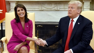 (FILES) US President Donald Trump shakes hands with Nikki Haley, the United States Ambassador to the United Nations in the Oval office of the White House on October 9, 2018 in Washington, DC. Former presidential hopeful Nikki Haley said May 22, 2024 she will vote for Donald Trump in November's US election, ending months of silence after quitting the contest to choose a Republican to face Joe Biden. (Photo by Olivier Douliery / AFP) (AFP) (FILES) US President Donald Trump shakes hands with Nikki Haley, the United States Ambassador to the United Nations in the Oval office of the White House on October 9, 2018 in Washington, DC. Former presidential hopeful Nikki Haley said May 22, 2024 she will vote for Donald Trump in November's US election, ending months of silence after quitting the contest to choose a Republican to face Joe Biden. (Photo by Olivier Douliery / AFP) (AFP)