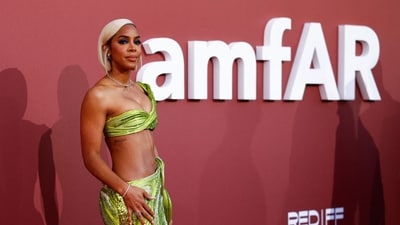 Kelly Rowland dazzled in a stunning creation by Indian designer Gaurav Gupta at the amfAR Cinema Against AIDS Cannes Gala. Her ensemble, crafted in a striking green shade, showcased a one-shoulder bralette top adorned with mesmerizing detailing. Paired with a matching bodycon skirt embellished with intricate sequin work, Rowland epitomised elegance and glamour on the red carpet. (Photo by Sameer Al-Doumy / AFP) Kelly Rowland dazzled in a stunning creation by Indian designer Gaurav Gupta at the amfAR Cinema Against AIDS Cannes Gala. Her ensemble, crafted in a striking green shade, showcased a one-shoulder bralette top adorned with mesmerizing detailing. Paired with a matching bodycon skirt embellished with intricate sequin work, Rowland epitomised elegance and glamour on the red carpet. (Photo by Sameer Al-Doumy / AFP)