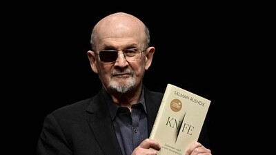 Indian-British novelist Salman Rushdie reacts on stage prior to a lecture from his book 'Knife: Meditations After an Attempted Murder', in Berlin on May 16, 2024. (Photo by Tobias SCHWARZ / AFP) (AFP) Indian-British novelist Salman Rushdie reacts on stage prior to a lecture from his book 'Knife: Meditations After an Attempted Murder', in Berlin on May 16, 2024. (Photo by Tobias SCHWARZ / AFP) (AFP)