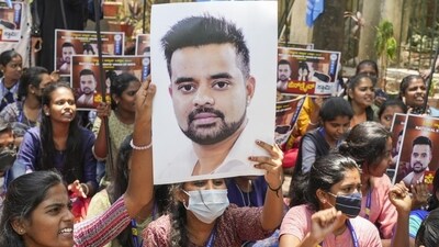 NSUI members hold a poster of JD(S) MP Prajwal Revanna during a protest against his involvement in the alleged sexual abuse case, in Bengaluru on April 30 (PTI FILE PHOTO) NSUI members hold a poster of JD(S) MP Prajwal Revanna during a protest against his involvement in the alleged sexual abuse case, in Bengaluru on April 30 (PTI FILE PHOTO)