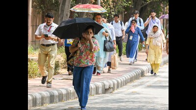 New Delhi, India - May 24, 2024: Commuters brave the Heat Wave in hot summer at CWG near Akshadham temple in New Delhi, India, on Friday, May 24, 2024. (Photo by Raj K Raj/ Hindustan Times) (Hindustan Times) New Delhi, India - May 24, 2024: Commuters brave the Heat Wave in hot summer at CWG near Akshadham temple in New Delhi, India, on Friday, May 24, 2024. (Photo by Raj K Raj/ Hindustan Times) (Hindustan Times)