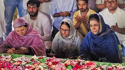 PDP Anantnag Lok Sabha candidate Mehbooba Mufti paying tribute to her father at his grave, in Bijbehara, Anantnag. (PTI) PDP Anantnag Lok Sabha candidate Mehbooba Mufti paying tribute to her father at his grave, in Bijbehara, Anantnag. (PTI)