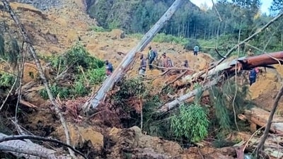 Hundreds are feared dead after a massive landslide buried a village in a remote, mountainous part of Papua New Guinea. (AFP) Hundreds are feared dead after a massive landslide buried a village in a remote, mountainous part of Papua New Guinea. (AFP)