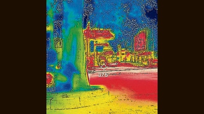 Thermal imagery represents heat levels at a petrol pump in Bengaluru. Idling vehicles turn the fuel station red, while areas around it remain a cooler blue. Thermal imagery represents heat levels at a petrol pump in Bengaluru. Idling vehicles turn the fuel station red, while areas around it remain a cooler blue.