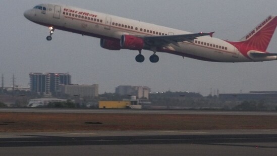 An Air India aircraft takes off at Kempegowda International Airport in Bengaluru. (AFP)
