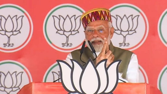 Prime Minister Narendra Modi addresses a public meeting for the Lok Sabha elections, in Mandi district on May 24. (PTI)