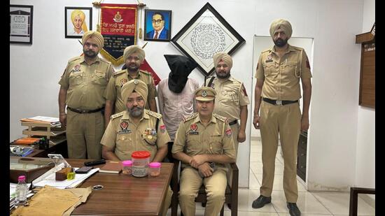 The accused in the custody of police in Mohali. (HT Photo)