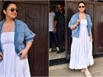 Parineeti Chopra looks stylish in white flared maxi dress and blue denim jacket.