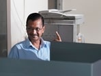 Delhi CM Arvind Kejriwal shows his finger marked with indelible ink after voting in New Delhi.&nbsp;