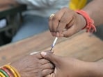 A voter gets finger marked before voting in the fifth phase of Lok Sabha elections. (PTI)