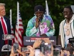 Rappers Sheff G, right, also known as Michael Williams, and Sleepy Hallow, center, also known as Tegan Chambers, join the Republican presidential candidate former President Donald Trump during a campaign rally in the south Bronx, Thursday, May. 23, 2024, in New York. (AP Photo/Yuki Iwamura) Rappers Sheff G, right, also known as Michael Williams, and Sleepy Hallow, center, also known as Tegan Chambers, join the Republican presidential candidate former President Donald Trump during a campaign rally in the south Bronx, Thursday, May. 23, 2024, in New York. (AP Photo/Yuki Iwamura)