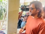 Former Indian cricketer MS Dhoni arrived at a polling booth