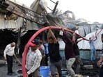 Firefighters try to extinguish a fire which broke out at an amusement park facility in Rajkot, in India's Gujarat state on May 25, 2024.. (Photo by AFP) Firefighters try to extinguish a fire which broke out at an amusement park facility in Rajkot, in India's Gujarat state on May 25, 2024.. (Photo by AFP)