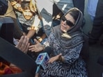 PDP chief Mehbooba Mufti sits on a protest after the alleged detention of her party workers, on the day of voting in the sixth phase of Lok Sabha elections, in Anantnag district, Saturday, May 25, 2024.