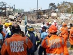 Rescue workers, including personnel from the National Disaster Relief Force (NDRF), scrutinised the debris manually as well as with machines to check for bodies or body parts. (Pramod Tambe) Rescue workers, including personnel from the National Disaster Relief Force (NDRF), scrutinised the debris manually as well as with machines to check for bodies or body parts. (Pramod Tambe)