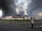 Smoke rises from a household item shopping mall which was hit by a Russian air strike, amid Russia's attack on Ukraine, in Kharkiv, Ukraine May 25, 2024. REUTERS/Sofiia Gatilova
