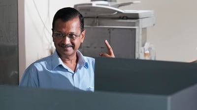 Delhi CM Arvind Kejriwal shows his finger marked with indelible ink after voting in New Delhi. (PTI) Delhi CM Arvind Kejriwal shows his finger marked with indelible ink after voting in New Delhi. (PTI)