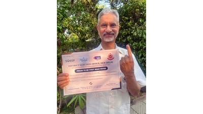 External Affairs Minister S Jaishankar, who also happened to be the first male voter at his designated polling booth, posed with his certificate for voting, in New Delhi. (ANI) External Affairs Minister S Jaishankar, who also happened to be the first male voter at his designated polling booth, posed with his certificate for voting, in New Delhi. (ANI)