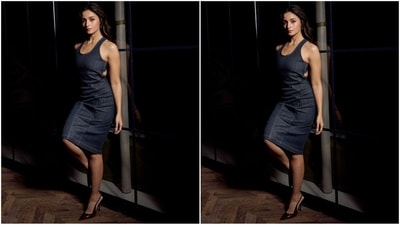 Her stylish sleeveless dress comes in a captivating indigo blue shade and features scoop neckline, luxurious denim fabric, rear zip fastening, criss-cross straps, bodycon fit, backless design and a midi hemline. (Instagram/@aliaabhatt) Her stylish sleeveless dress comes in a captivating indigo blue shade and features scoop neckline, luxurious denim fabric, rear zip fastening, criss-cross straps, bodycon fit, backless design and a midi hemline. (Instagram/@aliaabhatt)