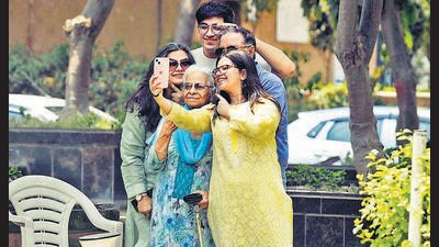 A family takes a group selfie after cast their vote during the sixth phase of the Lok Sabha elections in a condominium at Sohna Road Sector-49 in Gurugram on Saturday. (HT PHOTO) A family takes a group selfie after cast their vote during the sixth phase of the Lok Sabha elections in a condominium at Sohna Road Sector-49 in Gurugram on Saturday. (HT PHOTO)