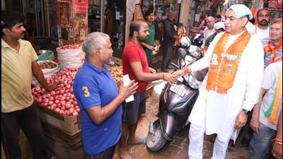 BJP candidate Sanjay Tandon during foot march in Chandigarh on Saturday. (HT Photo) BJP candidate Sanjay Tandon during foot march in Chandigarh on Saturday. (HT Photo)