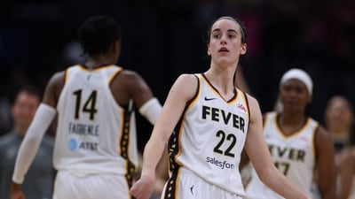 LOS ANGELES, CALIFORNIA - MAY 24: Caitlin Clark #22 of the Indiana Fever reacts at the end of the game after a 78-73 win over the Los Angeles Sparks at Crypto.com Arena on May 24, 2024 in Los Angeles, California. (Getty Images via AFP)